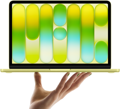 MacBook Neo na cor amarelo-cítrico equilibrado na ponta dos dedos de uma mão aberta. A tela mostra um padrão abstrato colorido